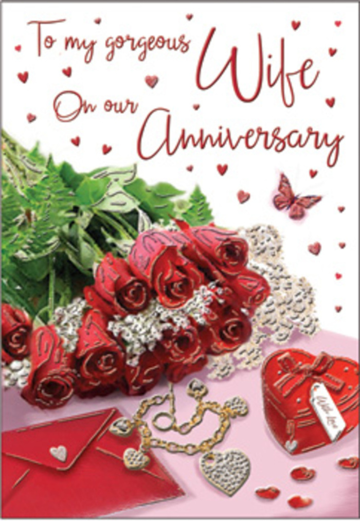 In this evocative anniversary composition, a small yet sumptuous gathering of red roses appears as though it has just been placed on a tidy table in a home overlooking Hackney Marshes. Each rose is fully open, the petals thick and velvety, layered in deep crimson tones that suggest enduring passion rather than fleeting infatuation. The blooms are nestled among sprigs of lush greenery, the leaves shining with a healthy, almost dewy sheen, much like plants along the canal paths on a bright morning. Just alongside the flowers rests an envelope, elegantly positioned so that its flap and a glimpse of the card within draw the eye towards the promise of a handwritten message. A piece of jewellery lies nearby, perhaps an anniversary gift, its metallic curve and subtle sparkle hinting at gold or silver warmed by the soft indoor light. A heart-shaped keepsake box adds another layer of sentiment, its smooth surface and rounded edges echoing the gentle curves of the rose petals. Scattered across the scene are delicate heart motifs and a single butterfly detail, lightly placed as if they have just fluttered down, adding a whimsical counterpoint to the otherwise calm, reflective mood. The light is diffused, with no harsh shadows, creating an atmosphere of quiet intimacy that feels familiar to anyone who has watched the late afternoon glow settle over Hackney's rooftops. This scene could easily accompany a bouquet delivered locally, where a couple celebrates their anniversary with flowers, a heartfelt card, and a small keepsake, turning an ordinary corner of East London into a private moment of deep affection.